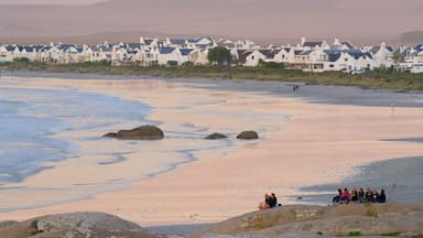 Paternoster Beach featuring a coastal town, a sunset and general coastal views
