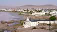 Paternoster Beach showing rocky coastline, general coastal views and a coastal town