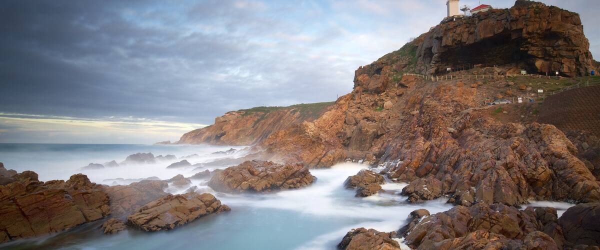 St. Blaize Lighthouse showing rugged coastline, landscape views and a lighthouse