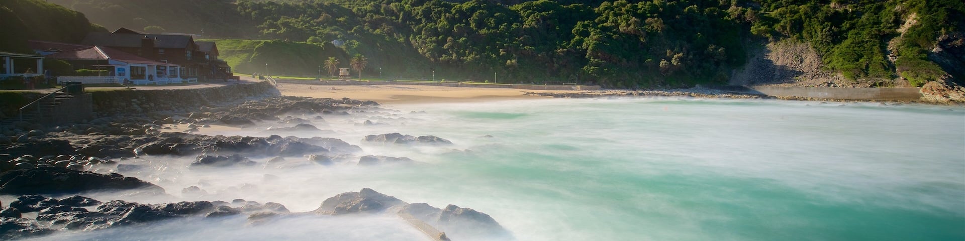 Victoria Bay Beach which includes a beach, rugged coastline and general coastal views