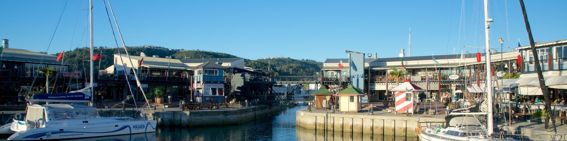 Knysna Quays featuring a bay or harbor, a coastal town and sailing