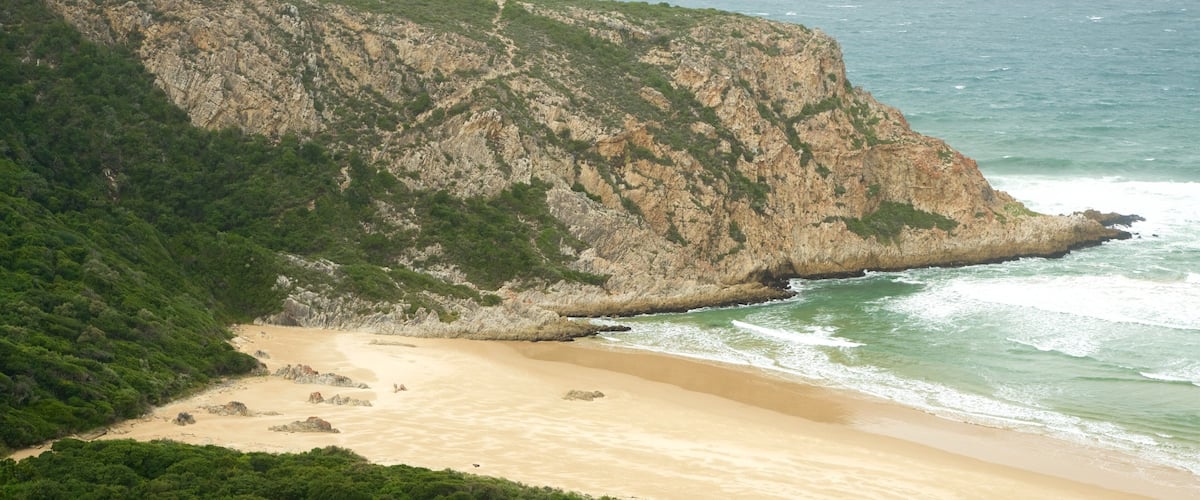 Natures Valley Beach featuring rugged coastline, general coastal views and a sandy beach