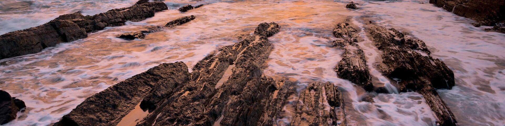 Tsitsikamma National Park which includes waves and rocky coastline