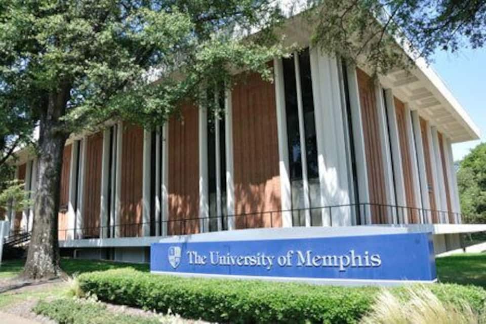 The University of Memphis building with a signboard.