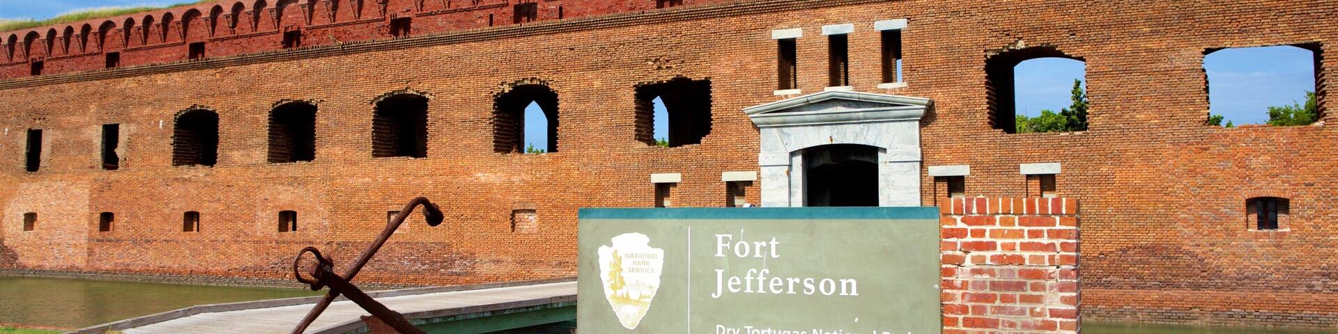Dry Tortugas National Park featuring a river or creek, a bridge and heritage elements