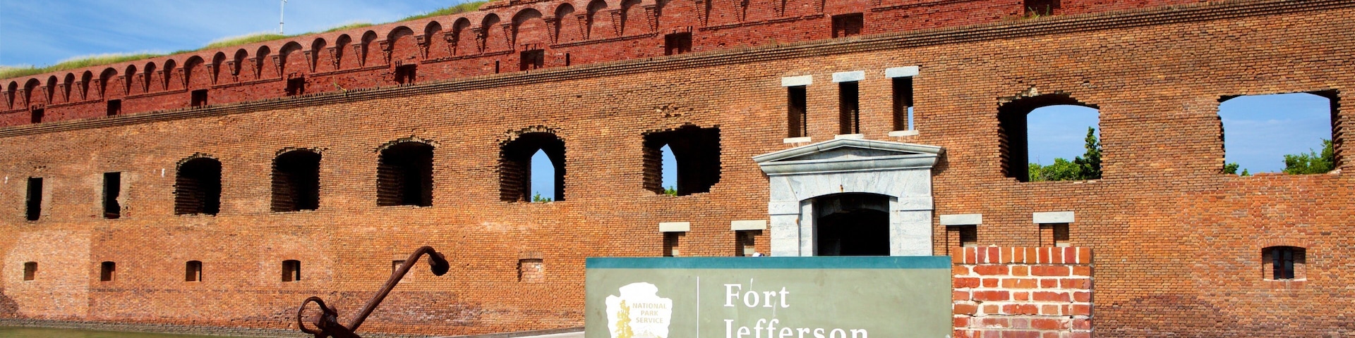 Dry Tortugas National Park showing heritage elements, a river or creek and signage