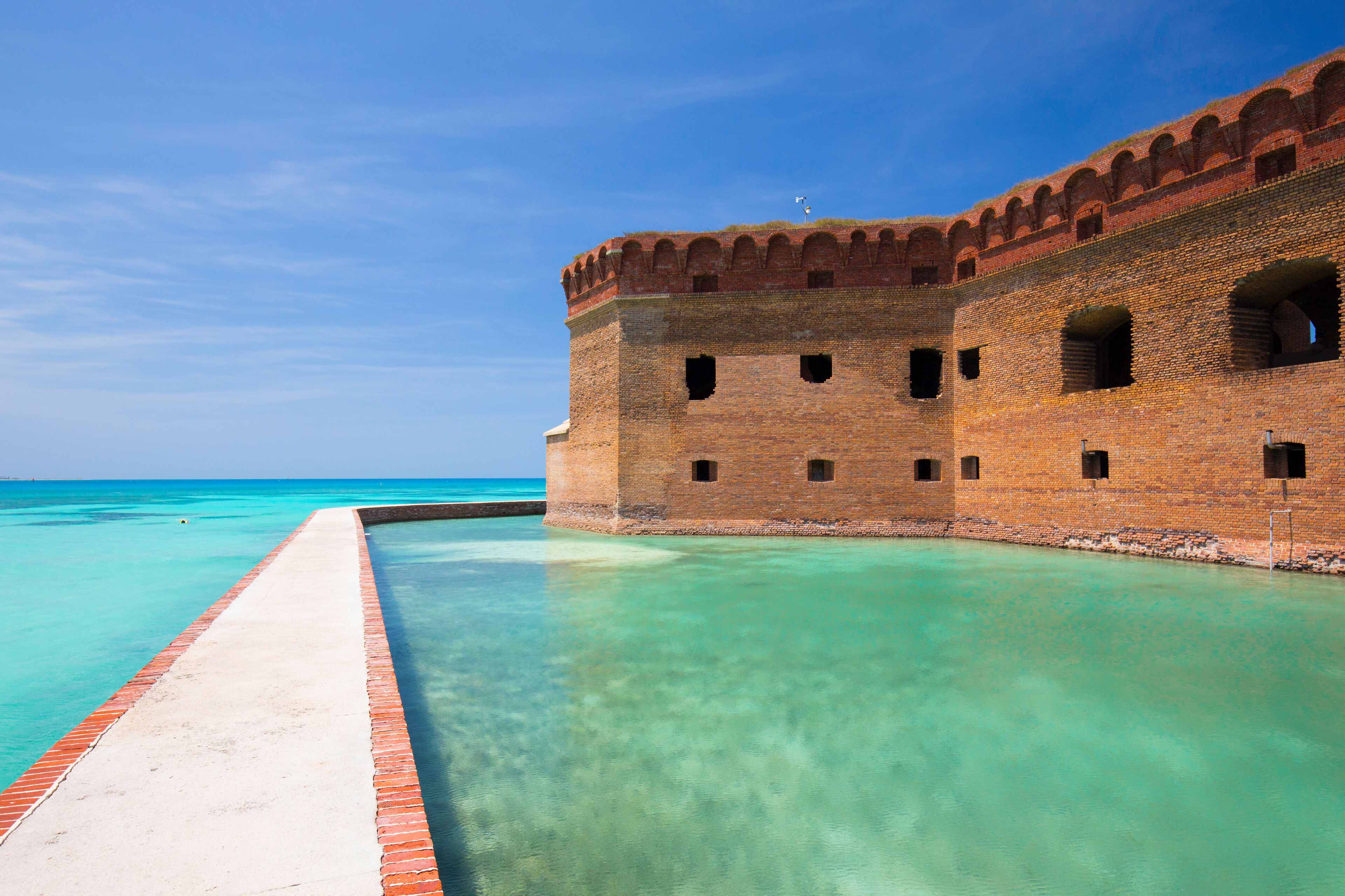 The crystal clear waters of the Gulf of Mexico surround Civil War Historic Fort Jefferson in the Dry Tortugas makes a great place for swimming and snorkeling; Shutterstock ID 405849691; Purchase Order