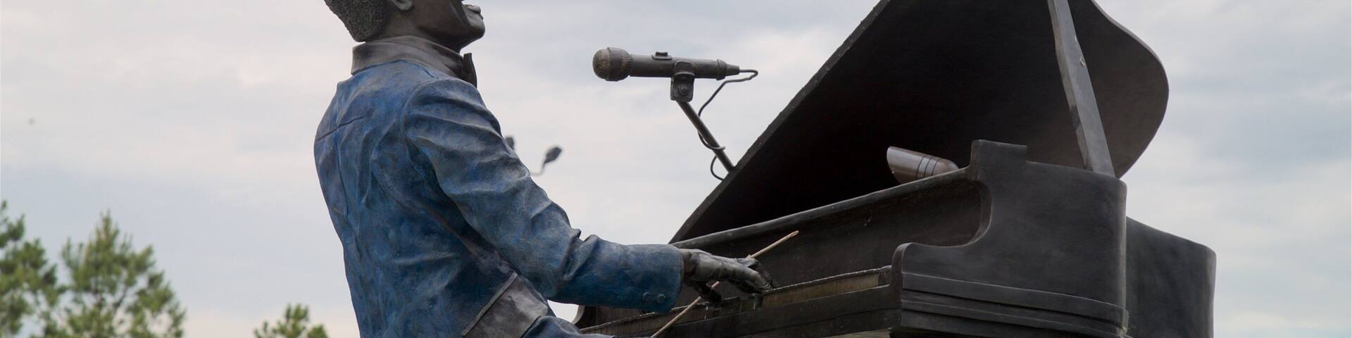 Ray Charles Plaza which includes a statue or sculpture