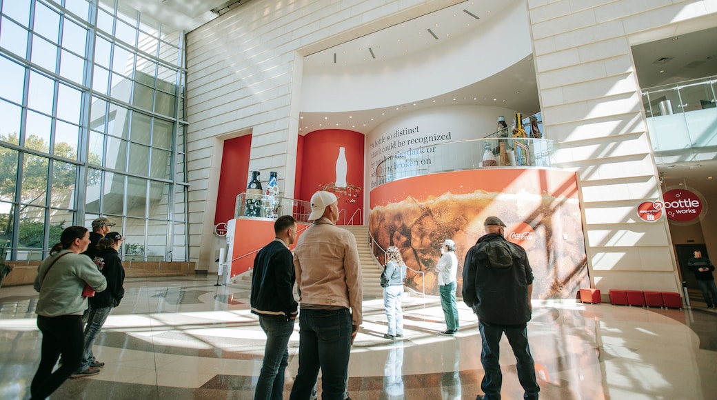 World of Coca-Cola showing interior views as well as a small group of people