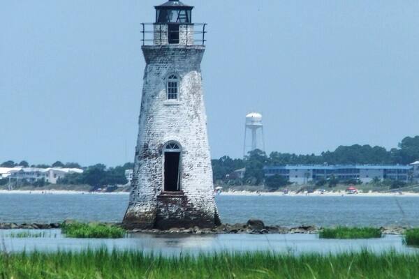 Beautiful lighthouse located near Tybee Island in Georgia. The smallest lighthouse in the state, it is accessible either by kayak or by a trail at the nearby Fort Pulaski