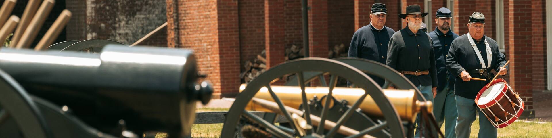 Fort Pulaski National Monument which includes performance art and heritage elements as well as a small group of people