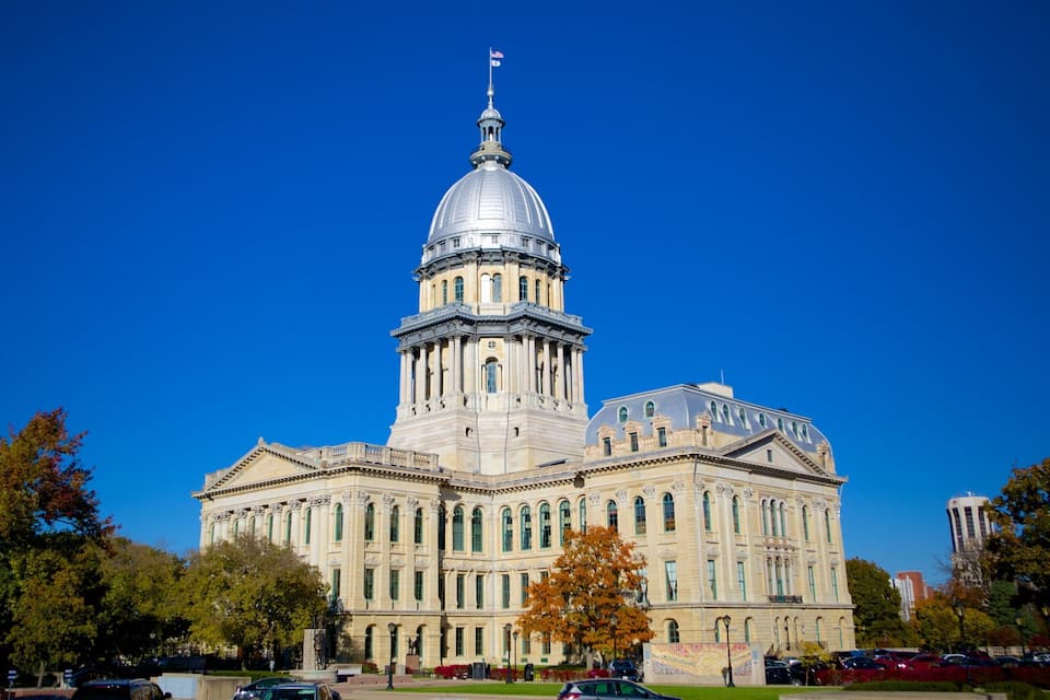 A large neoclassical building with a prominent dome and columns.