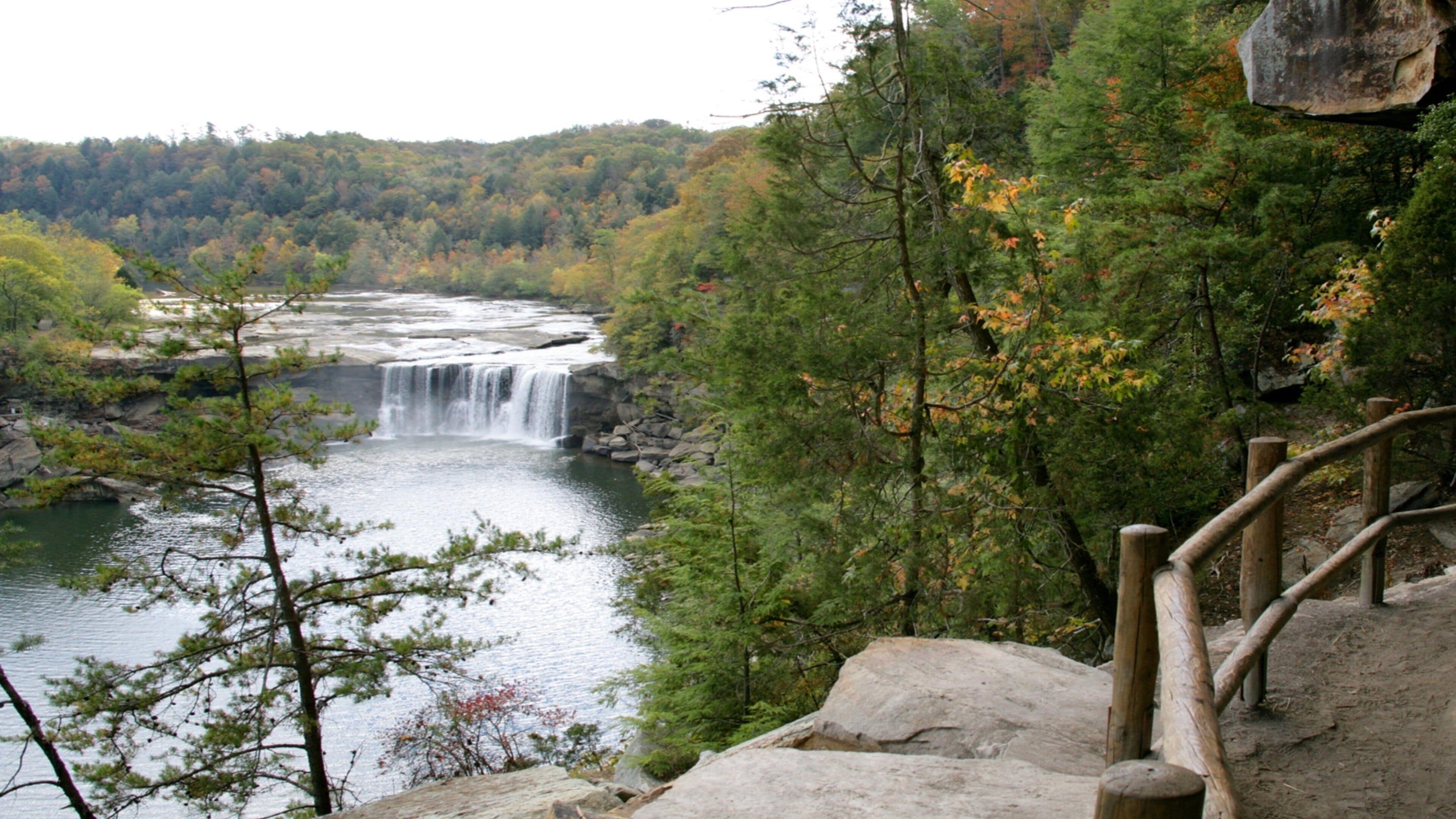 Cumberland Falls featuring a waterfall, a river or creek and tranquil scenes