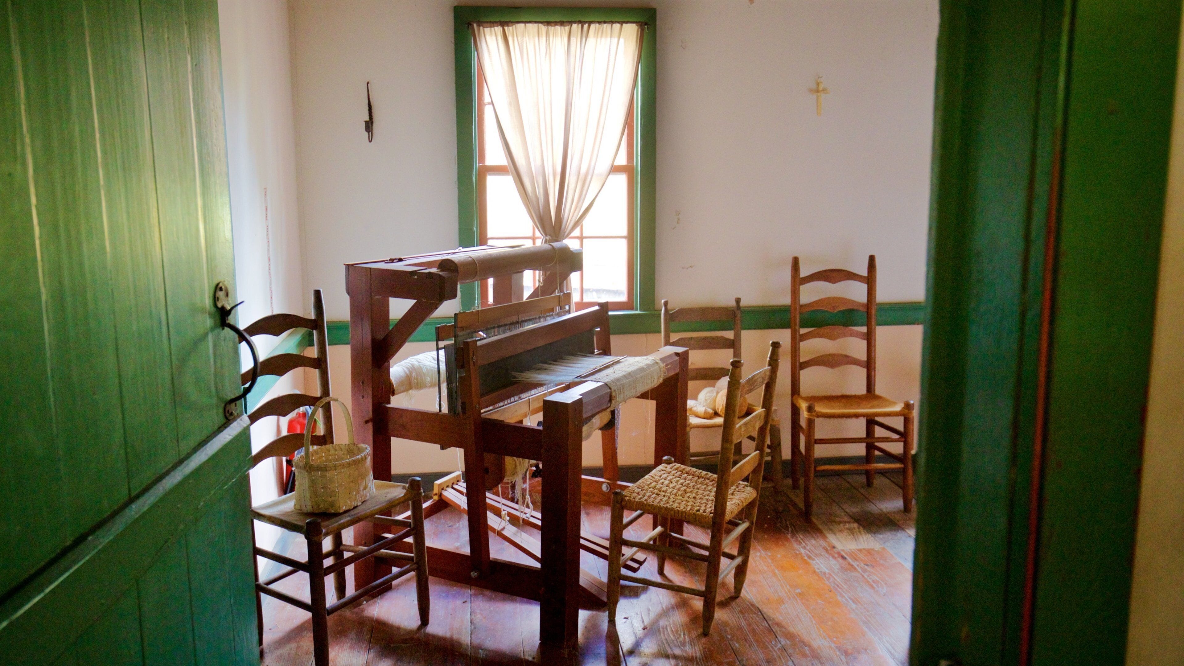 Vermilionville featuring a house, heritage elements and interior views