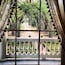 Looking out of the Master bedroom of the Rosedown Plantation. Sugarcane Plantation. Spring