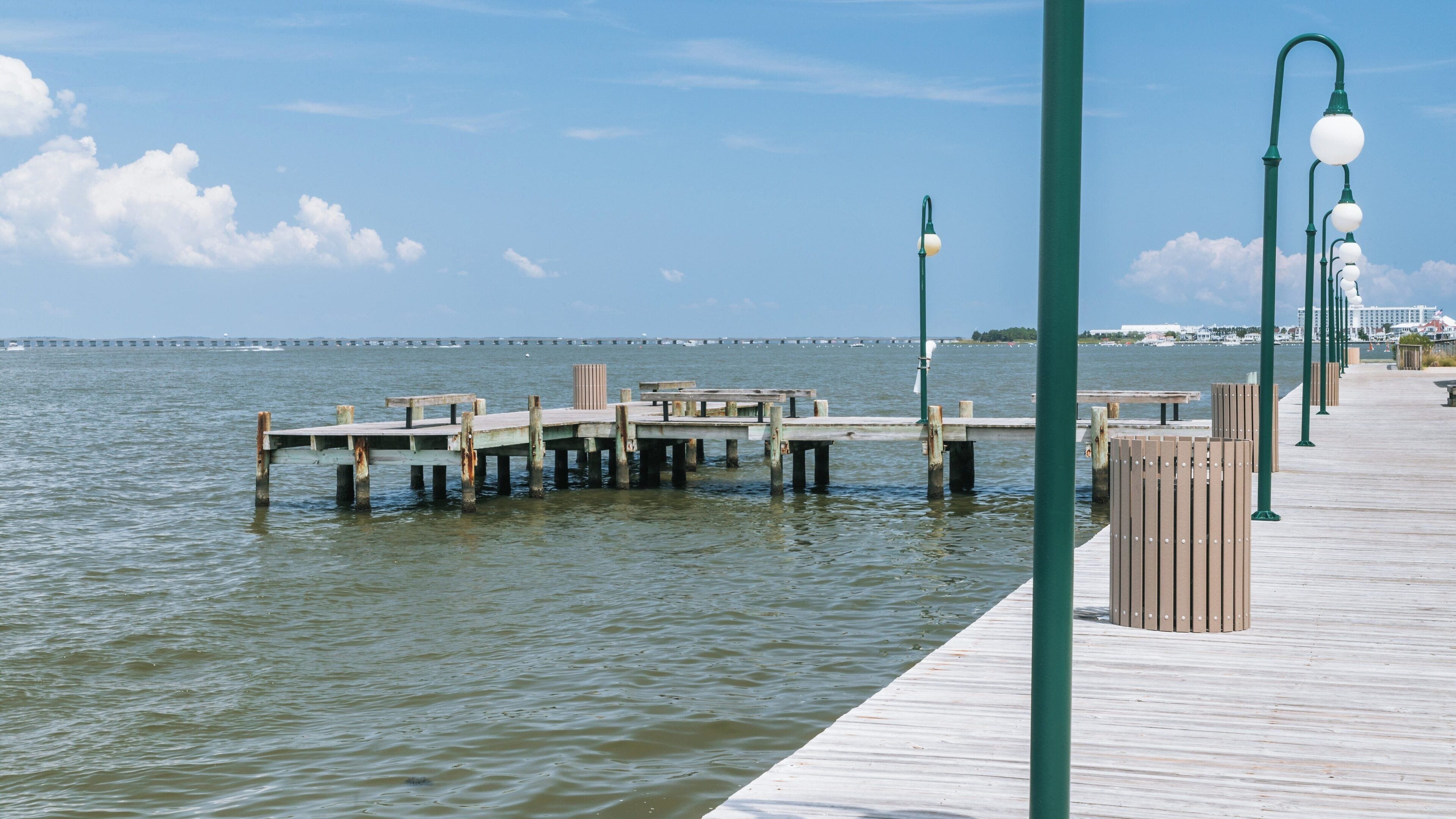 Roland E. Powell Convention Center view from the waterfront in Midtown Ocean City, Maryland with scenic piers and calm waters