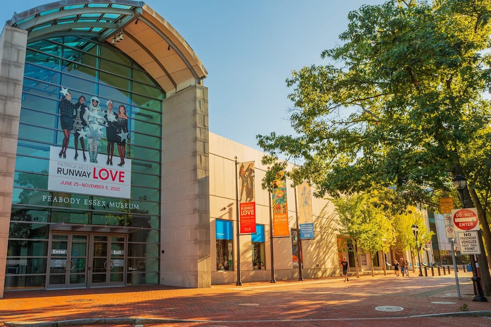 The Peabody Essex Museum with a 'Patrick Kelly Runway Love' poster.