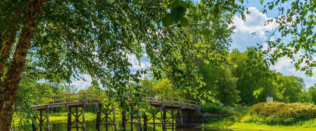 Old North Bridge featuring a river or creek and a bridge