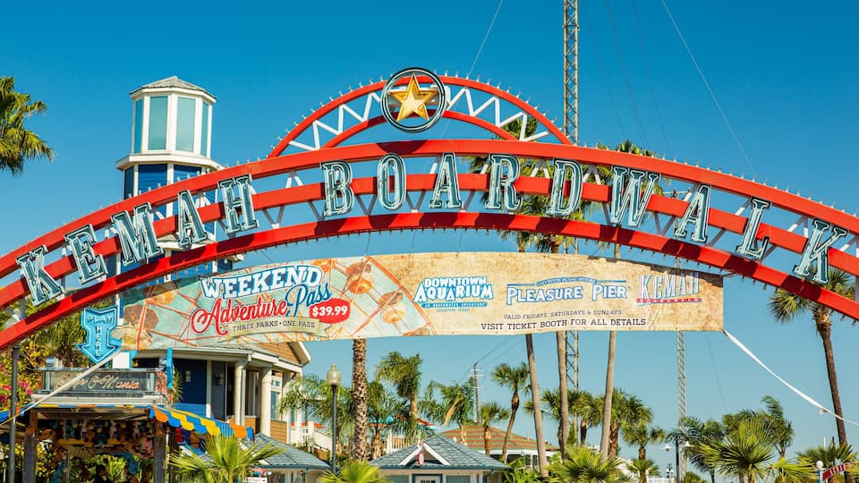A large sign with the text "KEMAH BOAT RAMP" and "Weekend Adventure Pass $39.99".