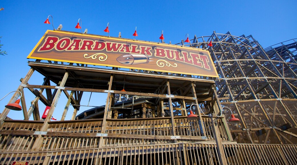 Kemah Boardwalk showing rides and signage