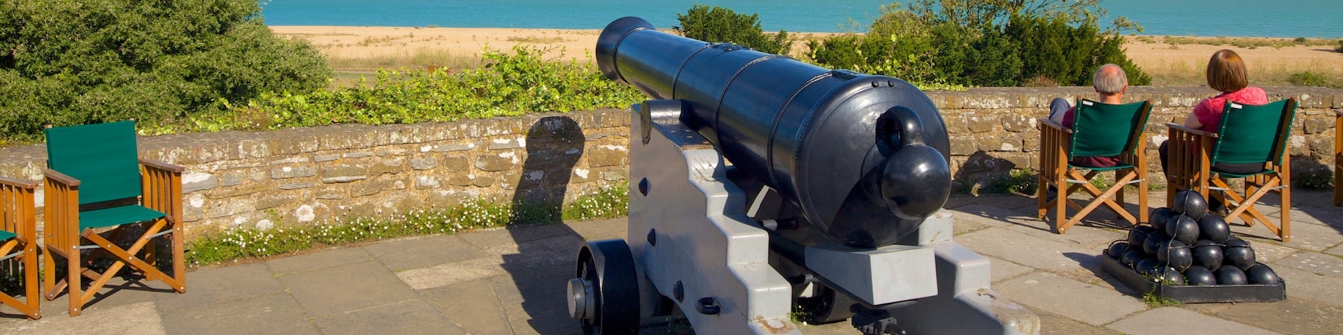 Walmer Castle and Gardens featuring general coastal views, a monument and military items