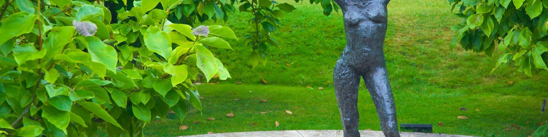 Penshurst Place and Gardens which includes outdoor art, a park and a statue or sculpture