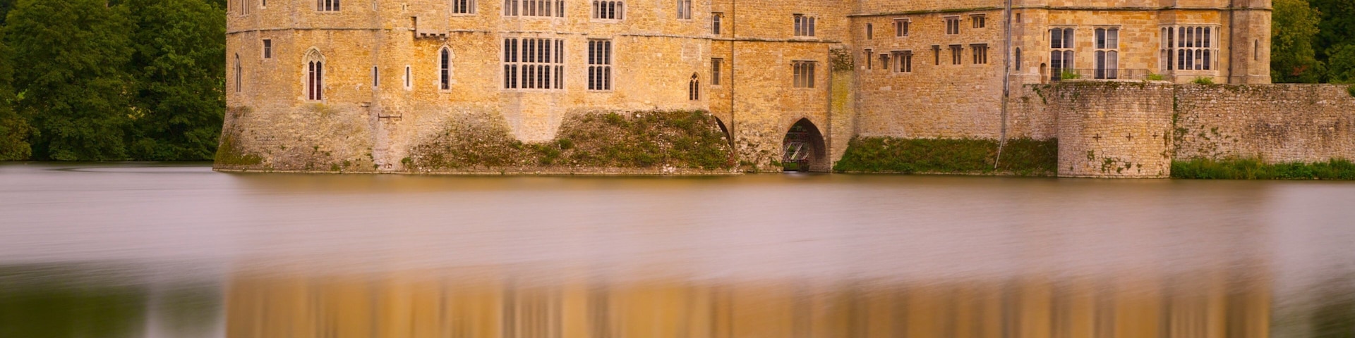 A large castle with multiple towers and a moat.