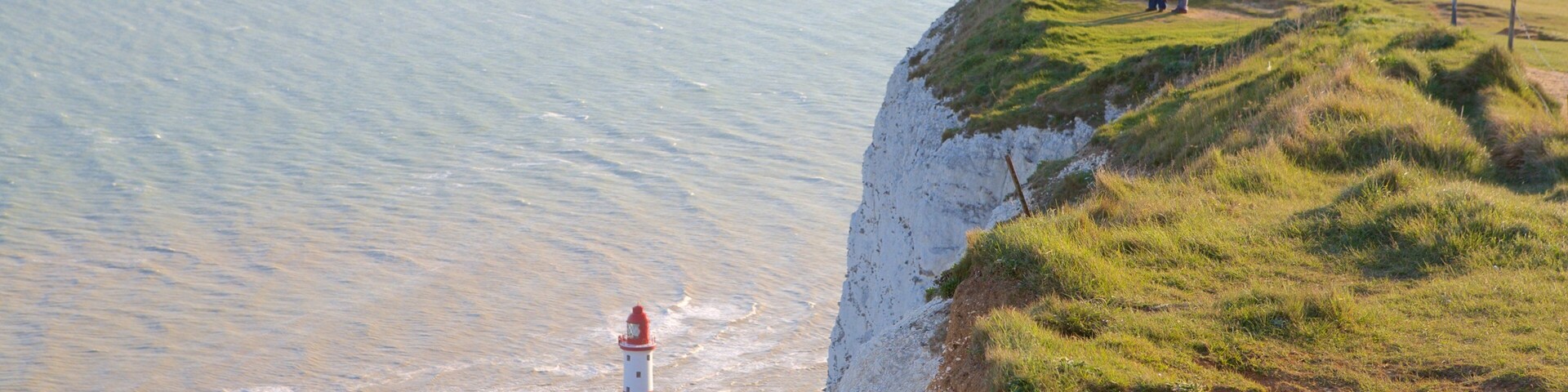 Beachy Head featuring a lighthouse and general coastal views