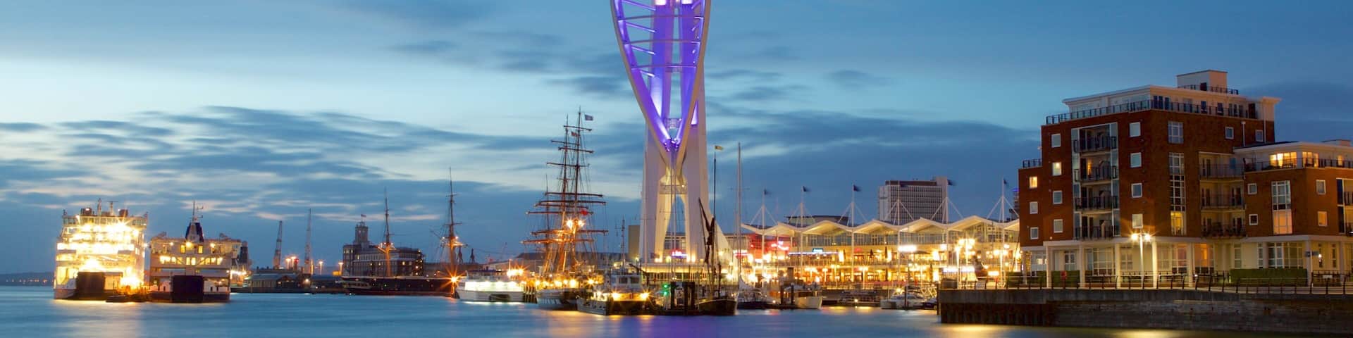 Spinnaker Tower which includes night scenes