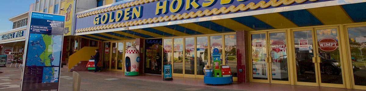 Clarence Pier which includes signage