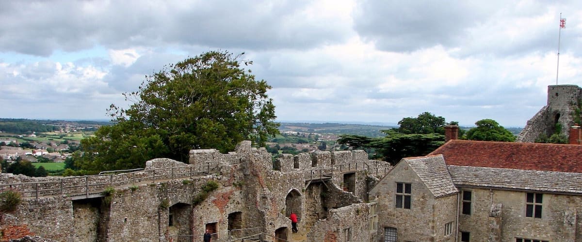 Carisbrooke Castle is a historic motte-and-bailey castle located in the village of Carisbrooke, near Newport, Isle of Wight, England. Charles I was imprisoned at the castle in the months prior to his trial
The site of Carisbrooke Castle may have been occupied in pre-Roman times. A ruined wall suggests that there was a building there in late Roman times. The Anglo-Saxon Chronicle mentions that Wihtgar, cousin of King Cynric of Wessex, died in AD 544, and was buried there. The Jutes may have taken over the fort by the late 7th century. An Anglo-Saxon stronghold occupied the site during the 8th century. Around 1000, a wall was built around the hill as a defence against Viking raids.