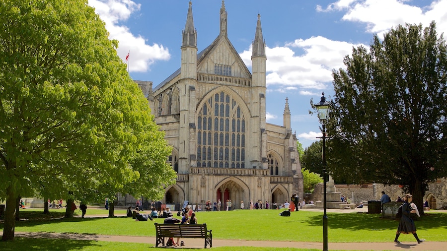 Winchester Cathedral which includes a garden, a church or cathedral and religious elements