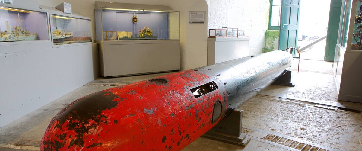 Nothe Fort featuring military items and interior views