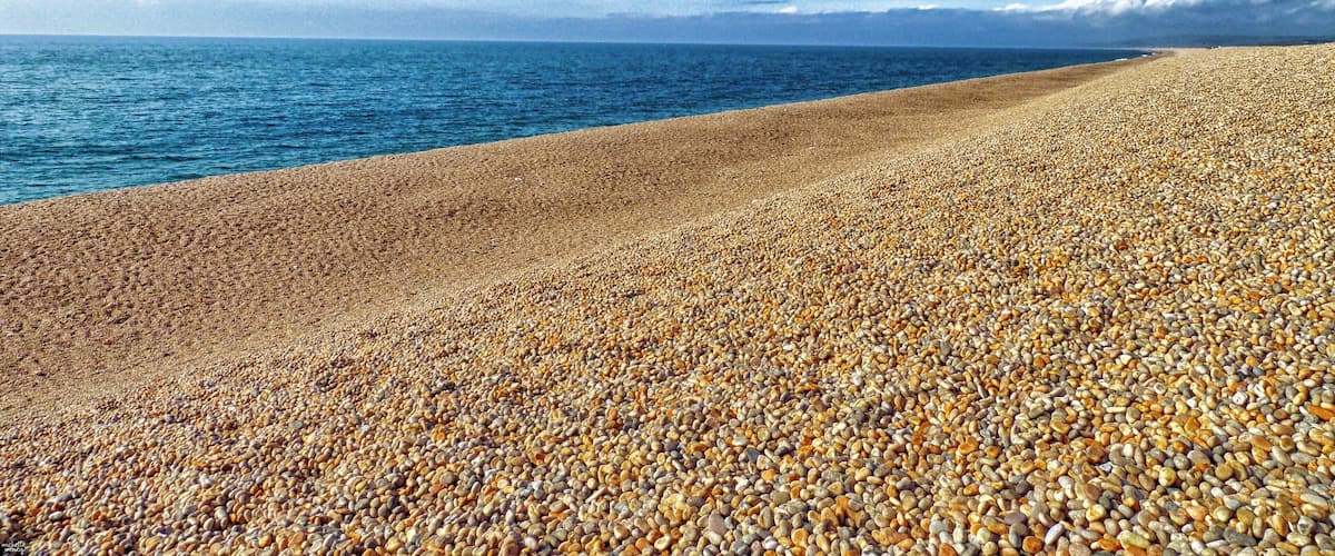 Portland, Dorset, England UK
Famous for a reason, Chesil Beach is 29km (18 miles) long! A UNESCO World Heritage Site along the fantastic Jurassic Coast. The shingle beach is not easy to walk on but is so impressive. Be sure to drive over to the Isle of Portland to capture the views of the coast in both directions.
#LifeAtExpedia
#bvsblue
#BeachTips