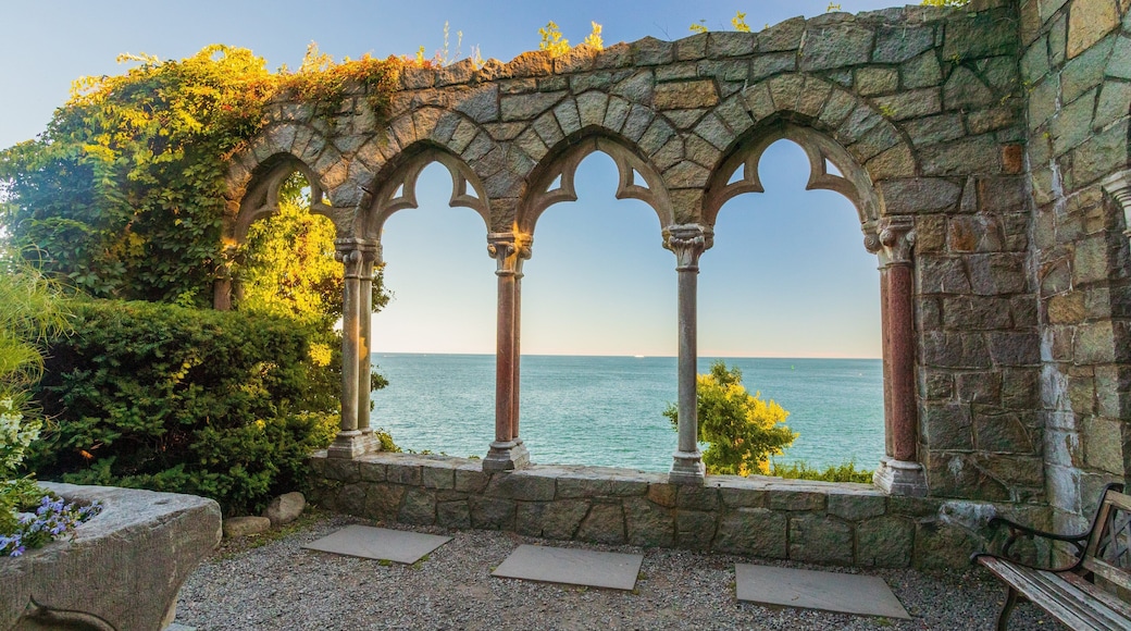 Hammond Castle which includes heritage elements, general coastal views and a sunset