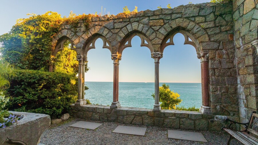 Hammond Castle which includes heritage elements, general coastal views and a sunset