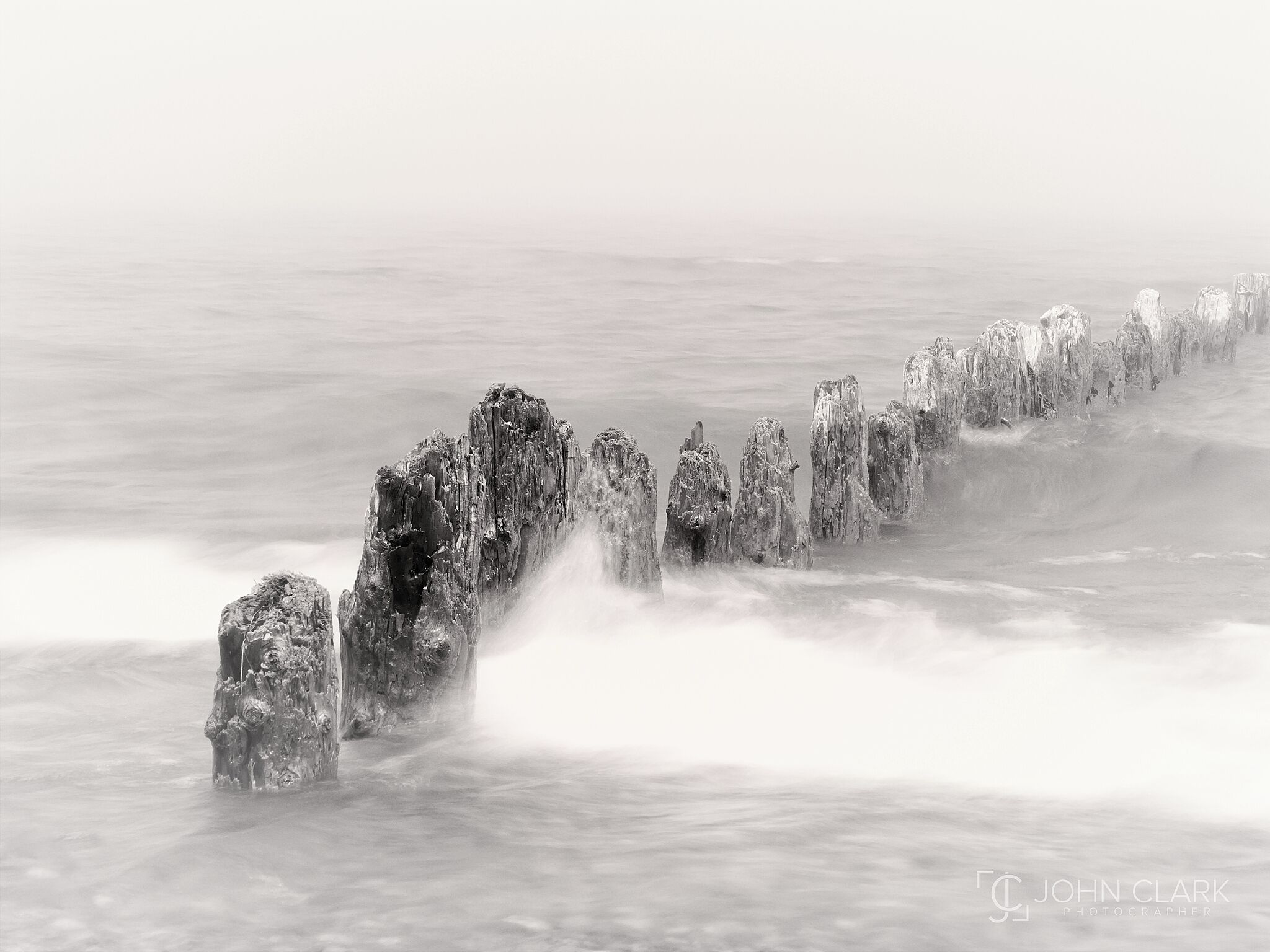 Old, abandoned pier remnants disappear in the fog rolling in from Lake Superior. 
#michigan #greatlakes #fog #lakesuperior #puremichigan