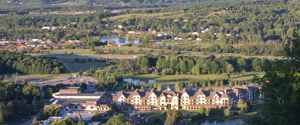 Ski lift ride to top of hill, nice view of Up North Michigan.