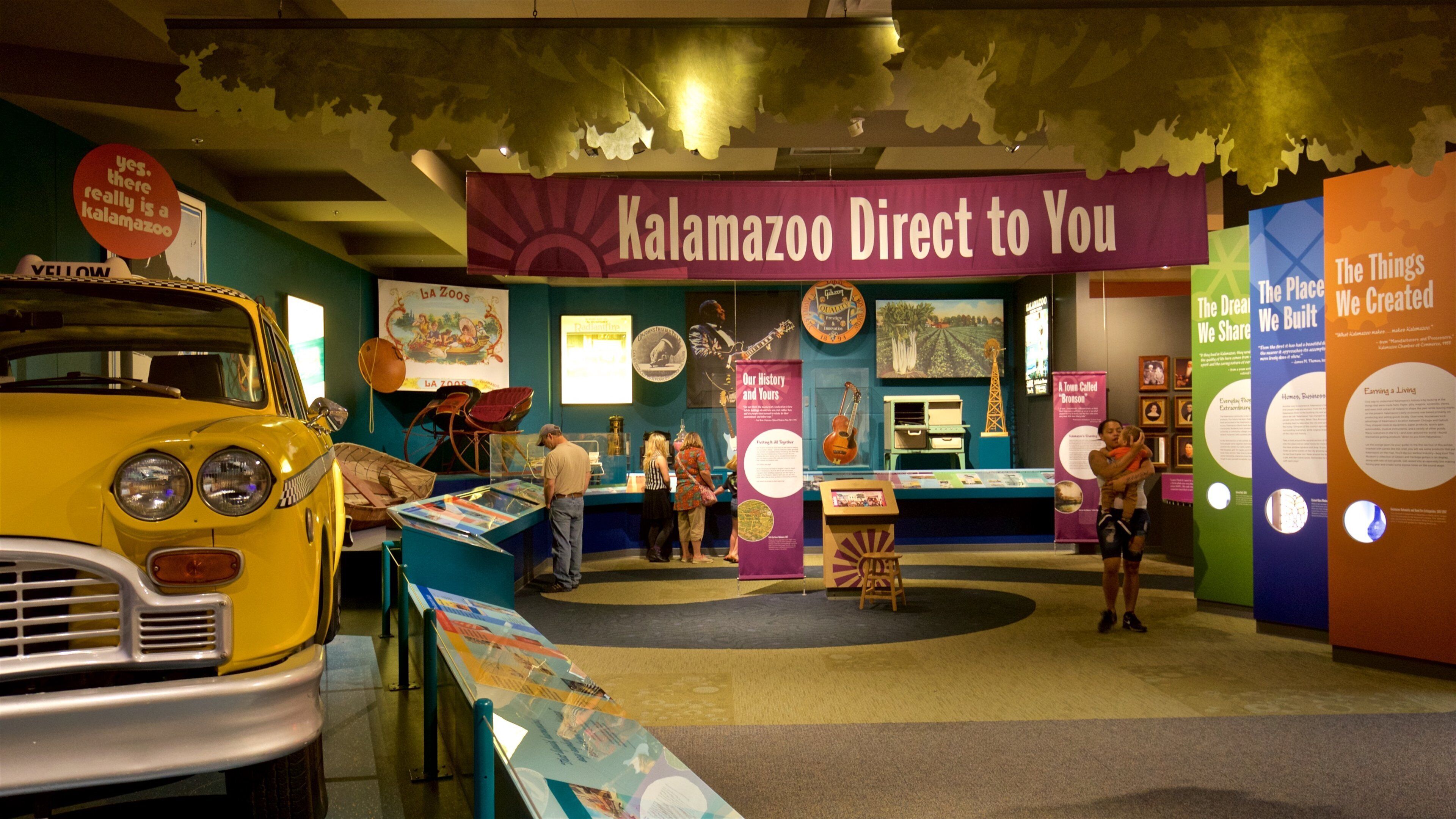 Kalamazoo Valley Museum showing interior views as well as a small group of people