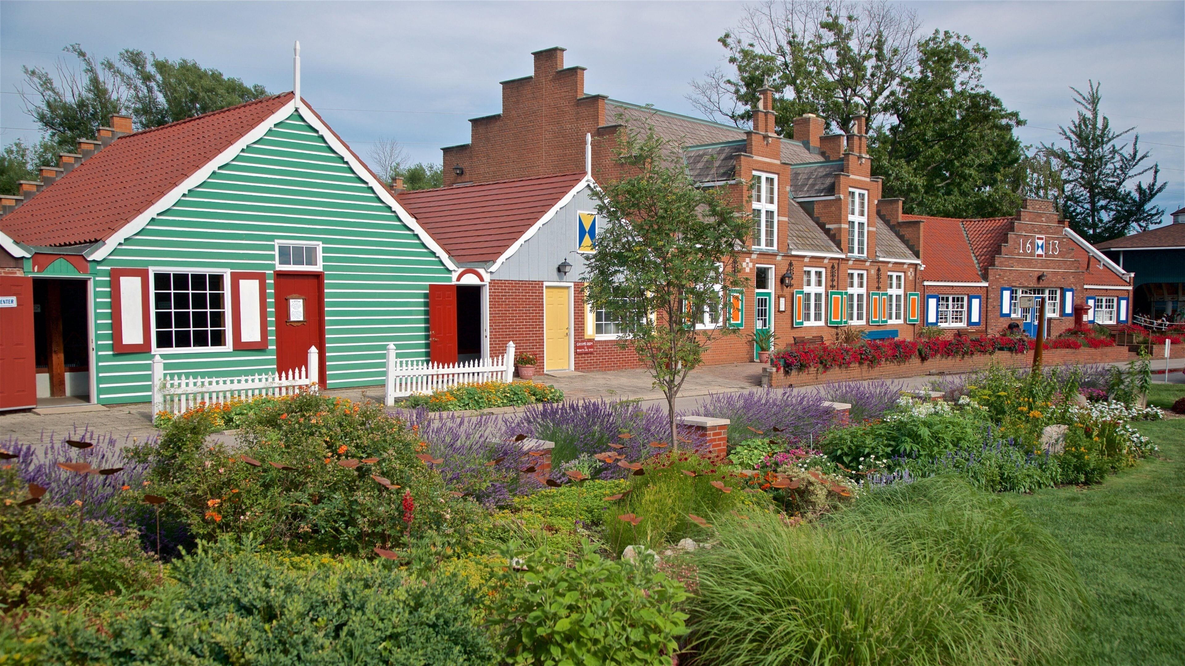 Windmill Island which includes wildflowers and a small town or village