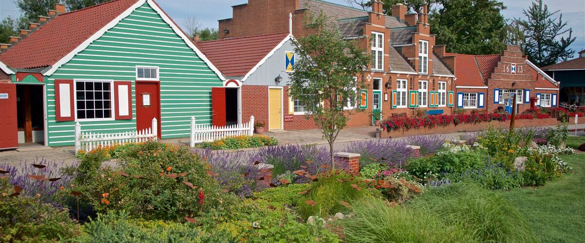 Windmill Island which includes wildflowers and a small town or village