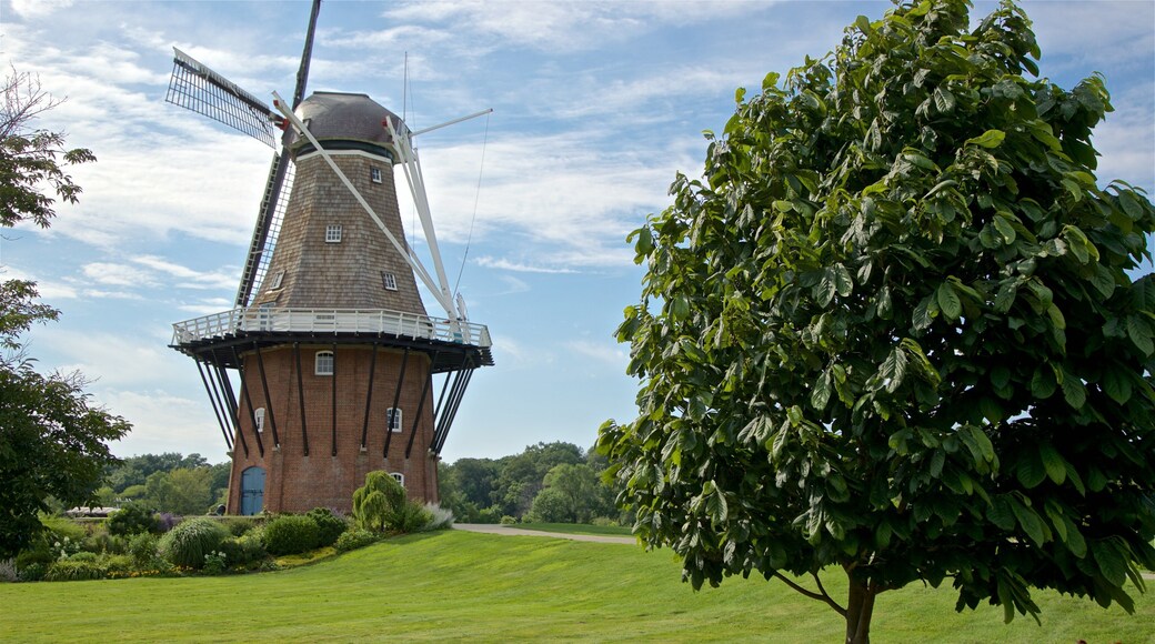 Windmill Island featuring a windmill and a garden