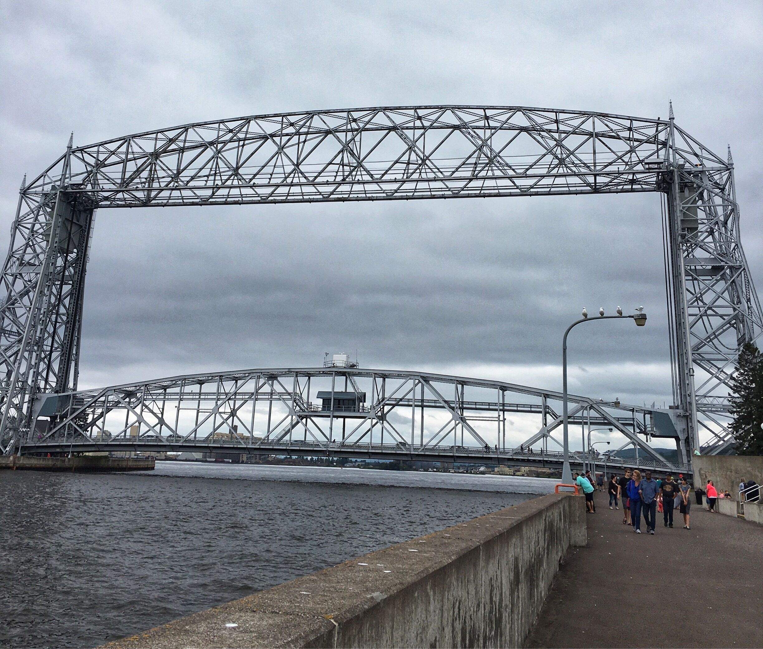 The Aerial Lift bridge is on the bank of Lake Superior.
Constructed in 1905, the bridge is a major landmark of the city. It was also the United States’ first transporter bridge. In 1929-30, this was converted to a vertical lift bridge giving way for the ships to pass through. #Duluth #TravelTales #RoadTrip