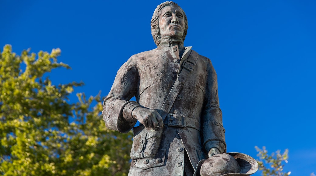 Biloxi Lighthouse which includes a statue or sculpture