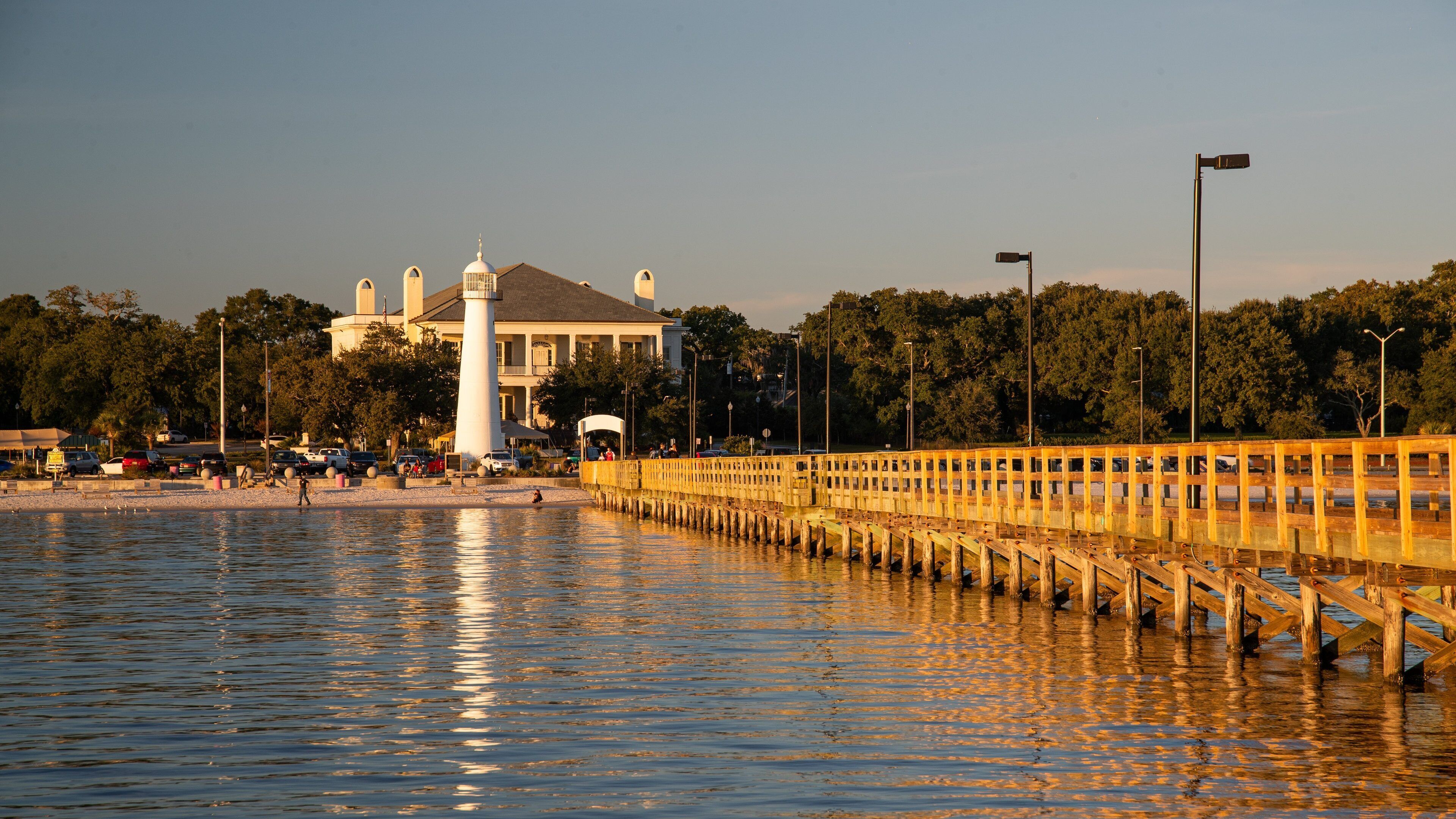 Biloxi Lighthouse featuring general coastal views, a lighthouse and a sunset