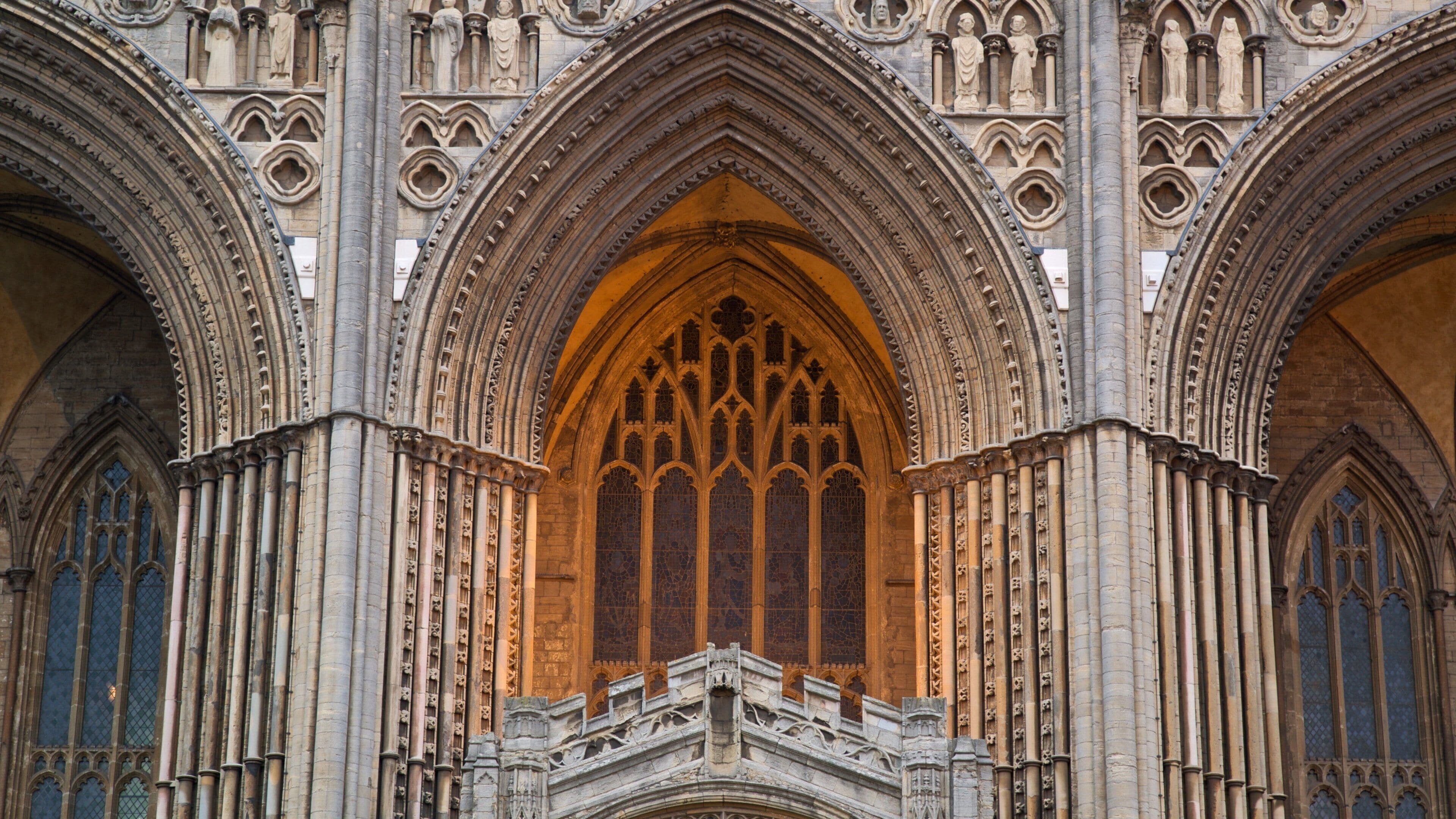 A Gothic cathedral with pointed arches and intricate stone carvings.