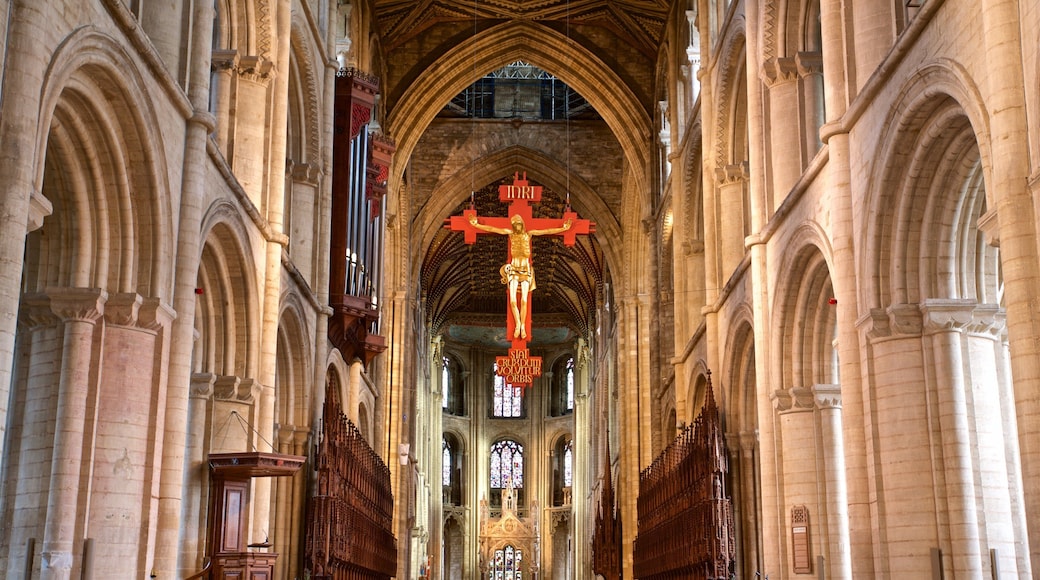 Peterborough Cathedral which includes interior views, religious elements and a church or cathedral