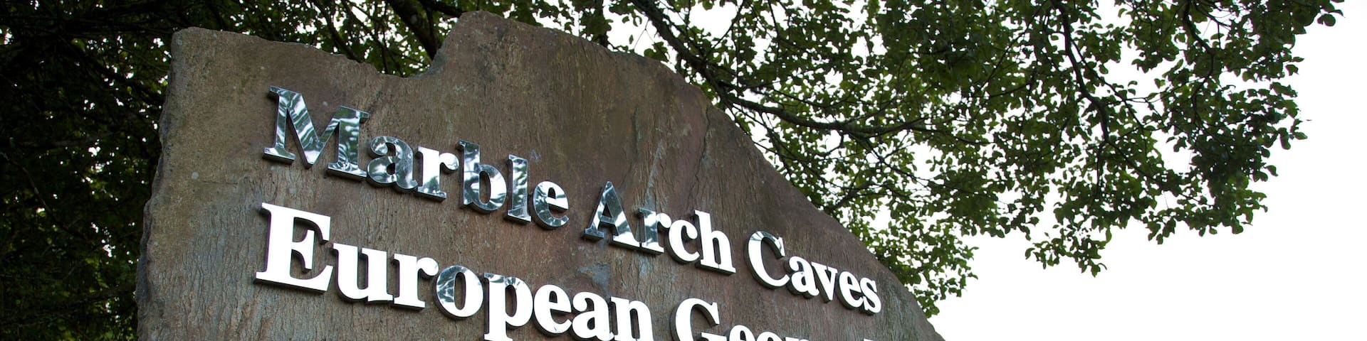 A sign for Marble Arch Caves European Geopark.