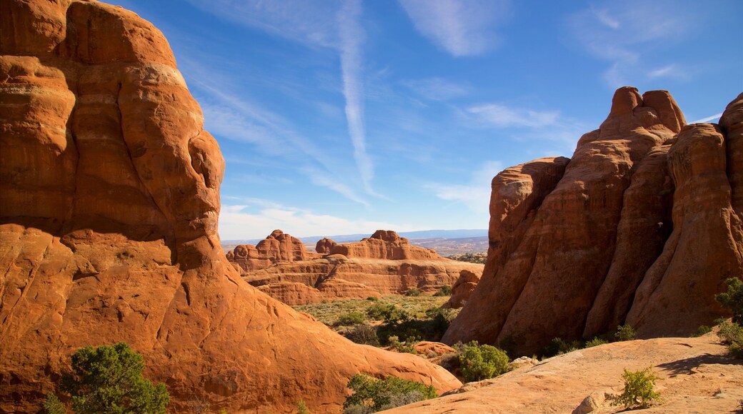 Arches National Park featuring tranquil scenes, desert views and a gorge or canyon
