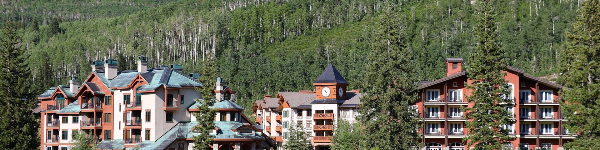 Solitude Mountain Resort showing a pond, forests and a small town or village